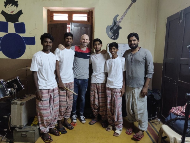 The band practicing for a performance in Mumbai