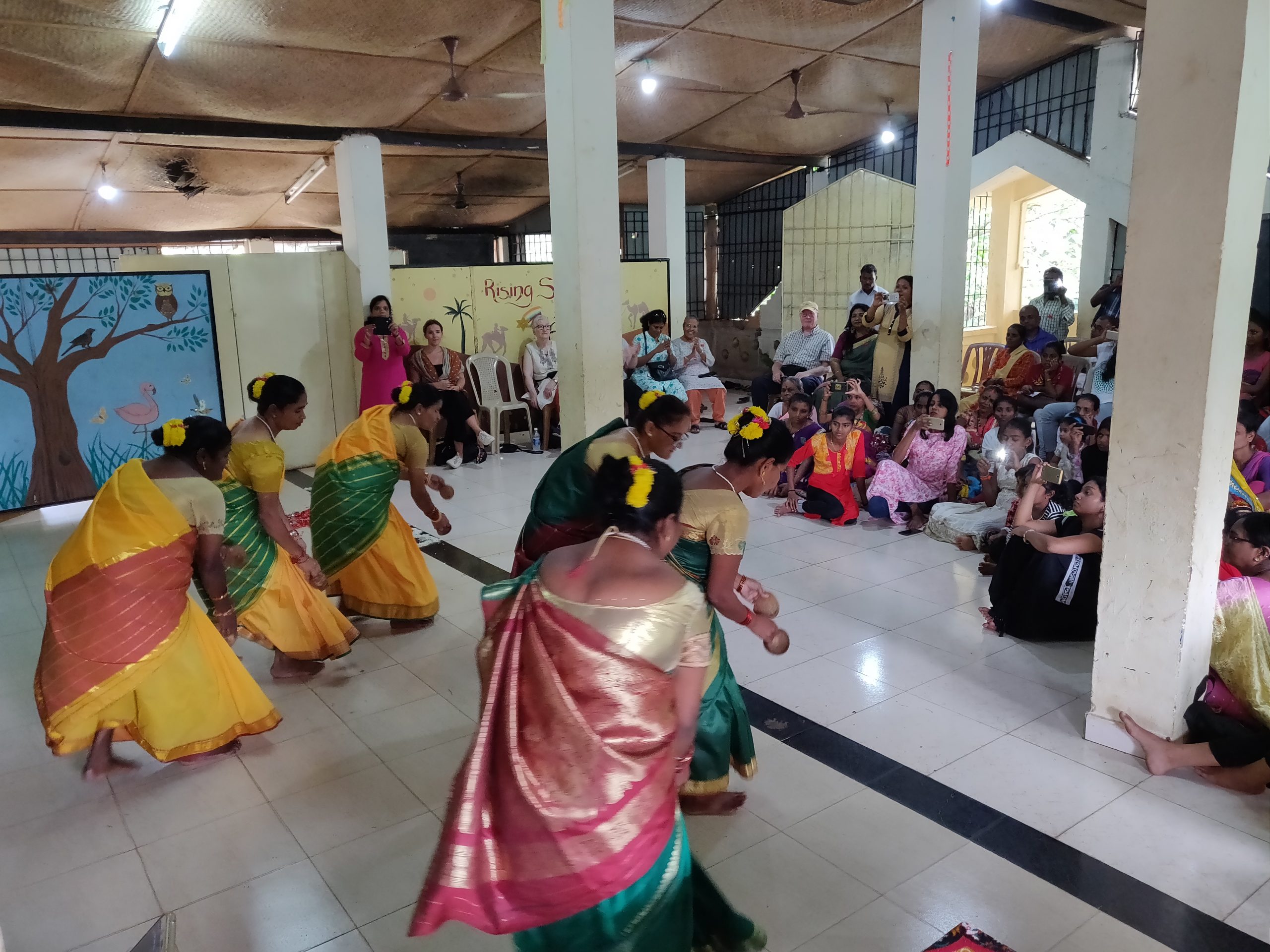 The ladies dance a traditional Goan dance with coconuts on World AIDS Day